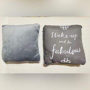 2 gray accent pillows